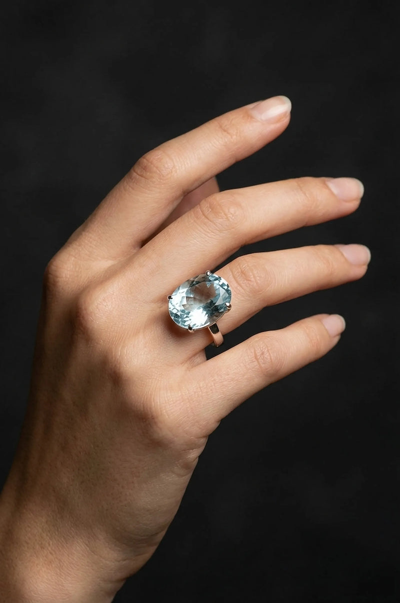 Woman wearing a custom large oval aquamarine ring in 925 silver sourced in Dubai