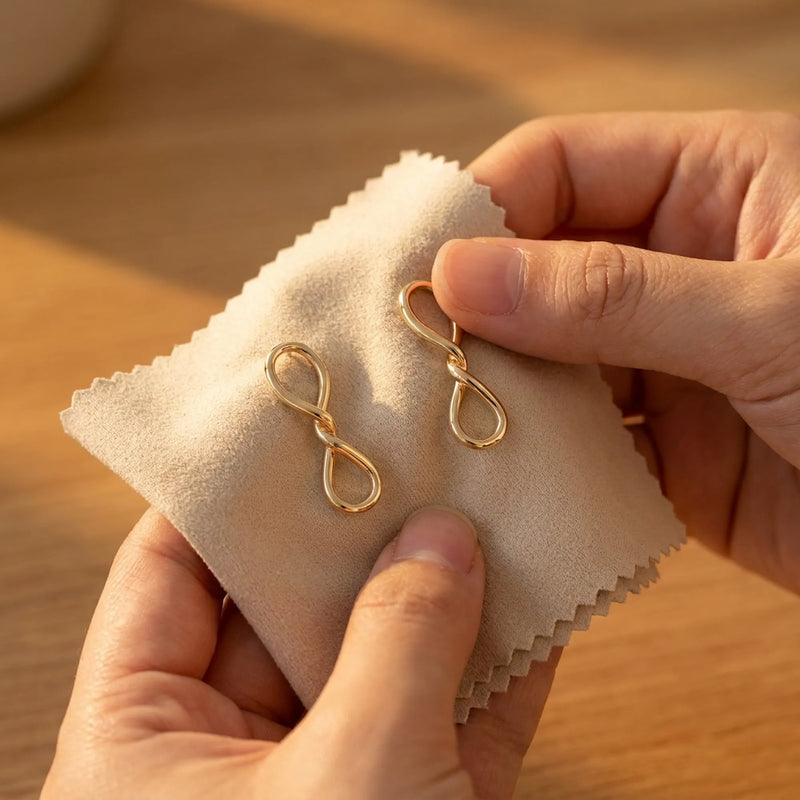 Luna Dura Learn how to gently clean gold plated jewelry by using a soft microfiber cloth on these beautiful gold infinity symbol earrings UAE.