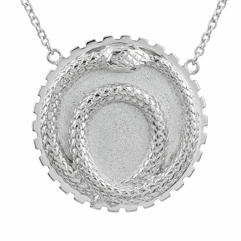 Ouroboros meaning — silver snake eating its own tail pendant in 925 sterling silver, handcrafted in Dubai by Luna Dura.