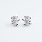 925 silver teddy bear stud earrings isolated on a white background in a Dubai studio.