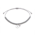 faceted bead bracelet with heart cutout silver charm in Dubai and cubic zirconia on nylon cord.
