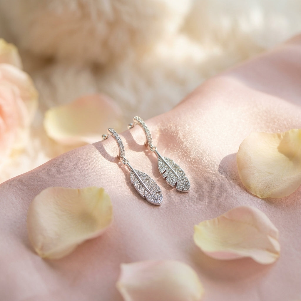 Crystal Feather Huggie Earrings in Sterling Silver