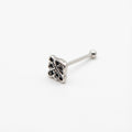 Silver nose ring in Dubai  with black gemstones on a white background