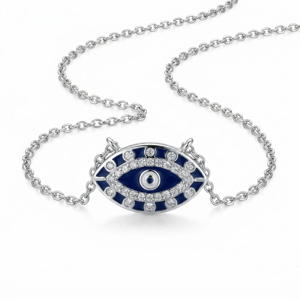 Silver necklace with a blue and white eye-shaped pendant on a white background
