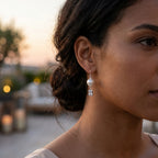 Woman wearing minimalist silver pearl earrings in Dubai