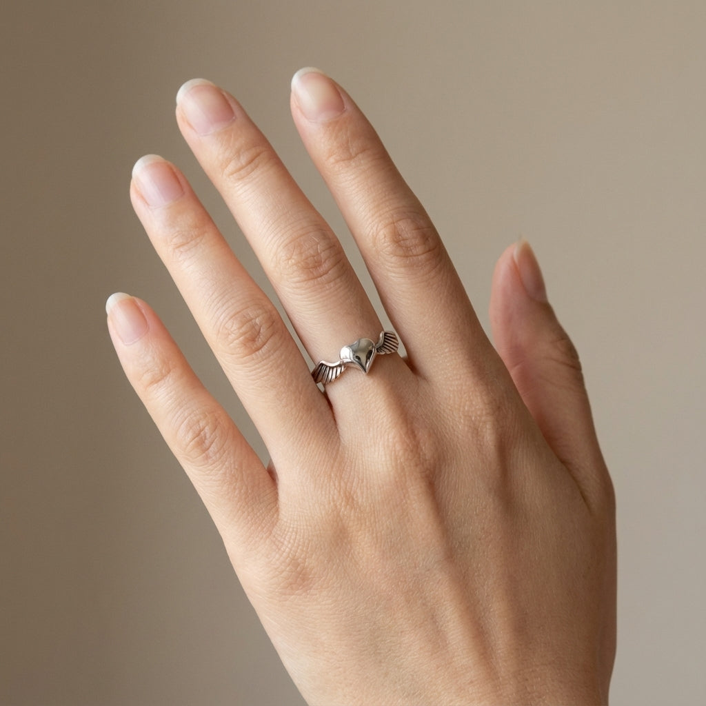 Oxidized Silver Heart Ring with Sculpted Feathered Band