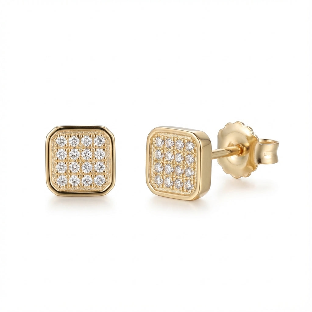 Gold square earrings with diamond accents on a white background