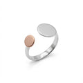 open silver ring with two polished circular discs in silver and rose gold tone minimalist design