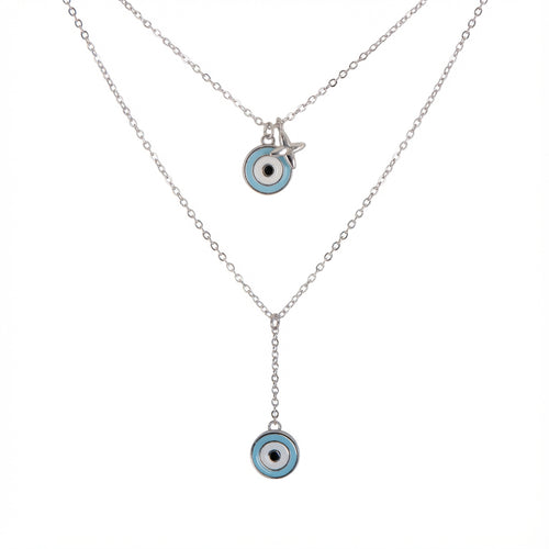Necklace 925 silver with two blue evil eye pendants in Dubai on a white background.