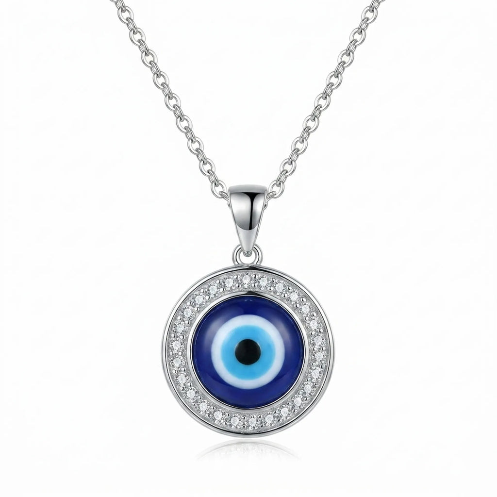 Silver necklace with blue enamel evil eye pendant and white cubic zirconia detailing