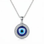 Silver necklace with blue enamel evil eye pendant and white cubic zirconia detailing