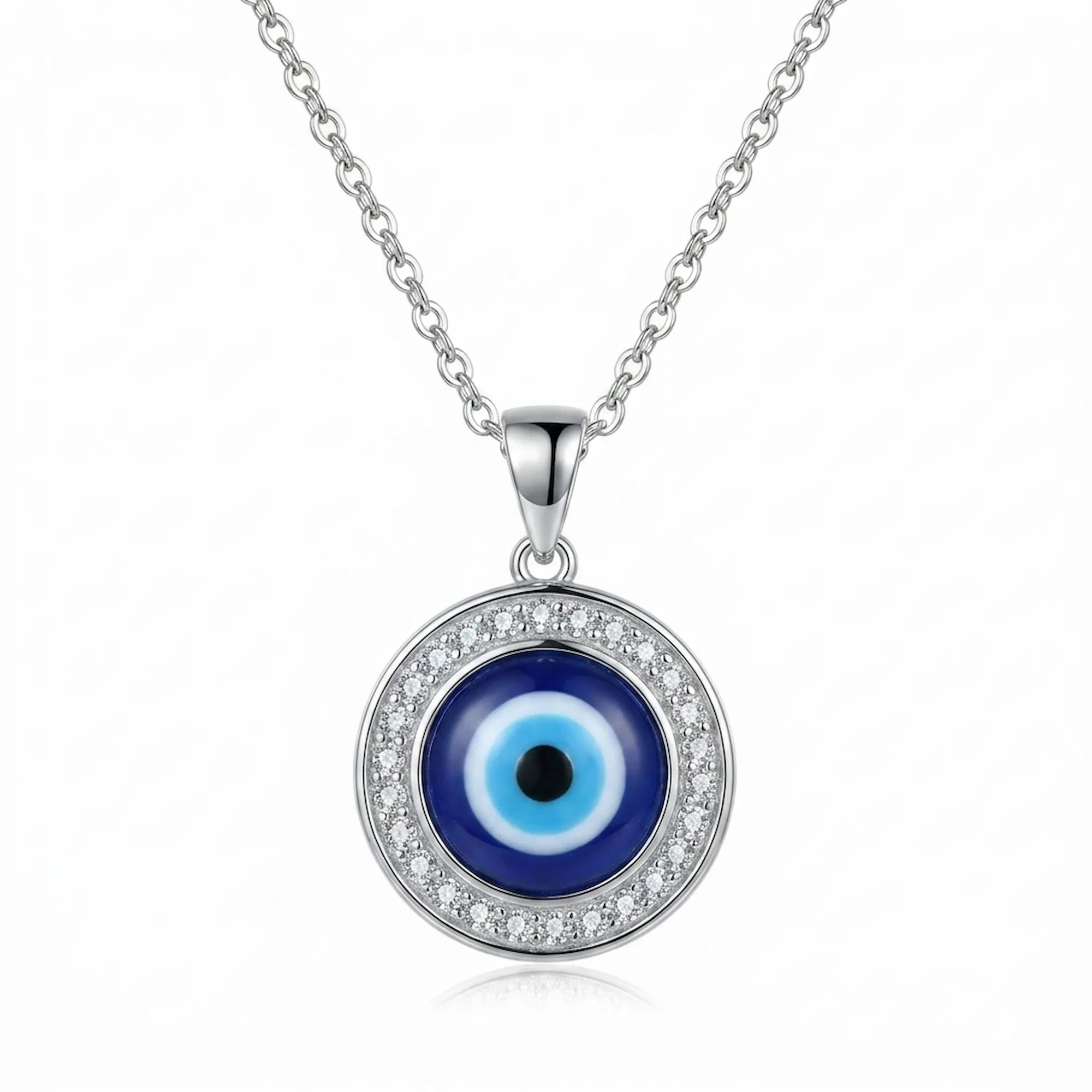 Silver necklace with blue enamel evil eye pendant and white cubic zirconia detailing