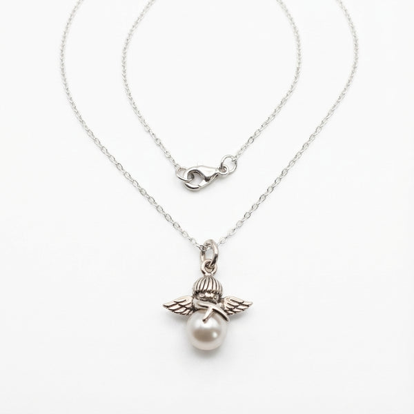 Cupid Necklace with a faux pearl pendant and silver angel wings on a white background