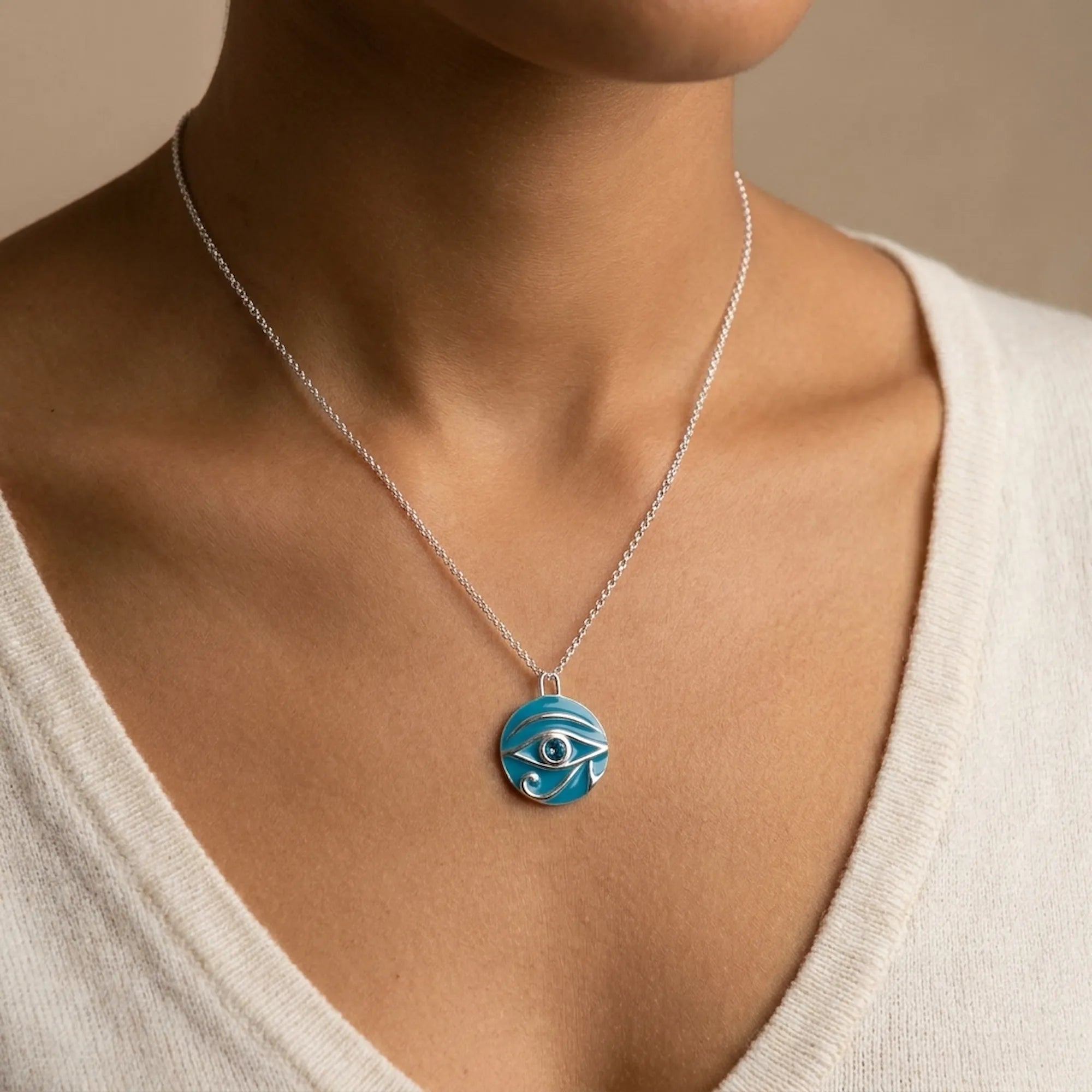 Necklace with a blue eye pendant worn by a model Size Reference Image