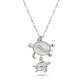 Silver turtle pendant necklace in Dubai with a chain on a white background.