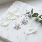 أقراط متدلية من الفضة الإسترلينية بتصميم فراشة مزخرفة بأحجار الراين