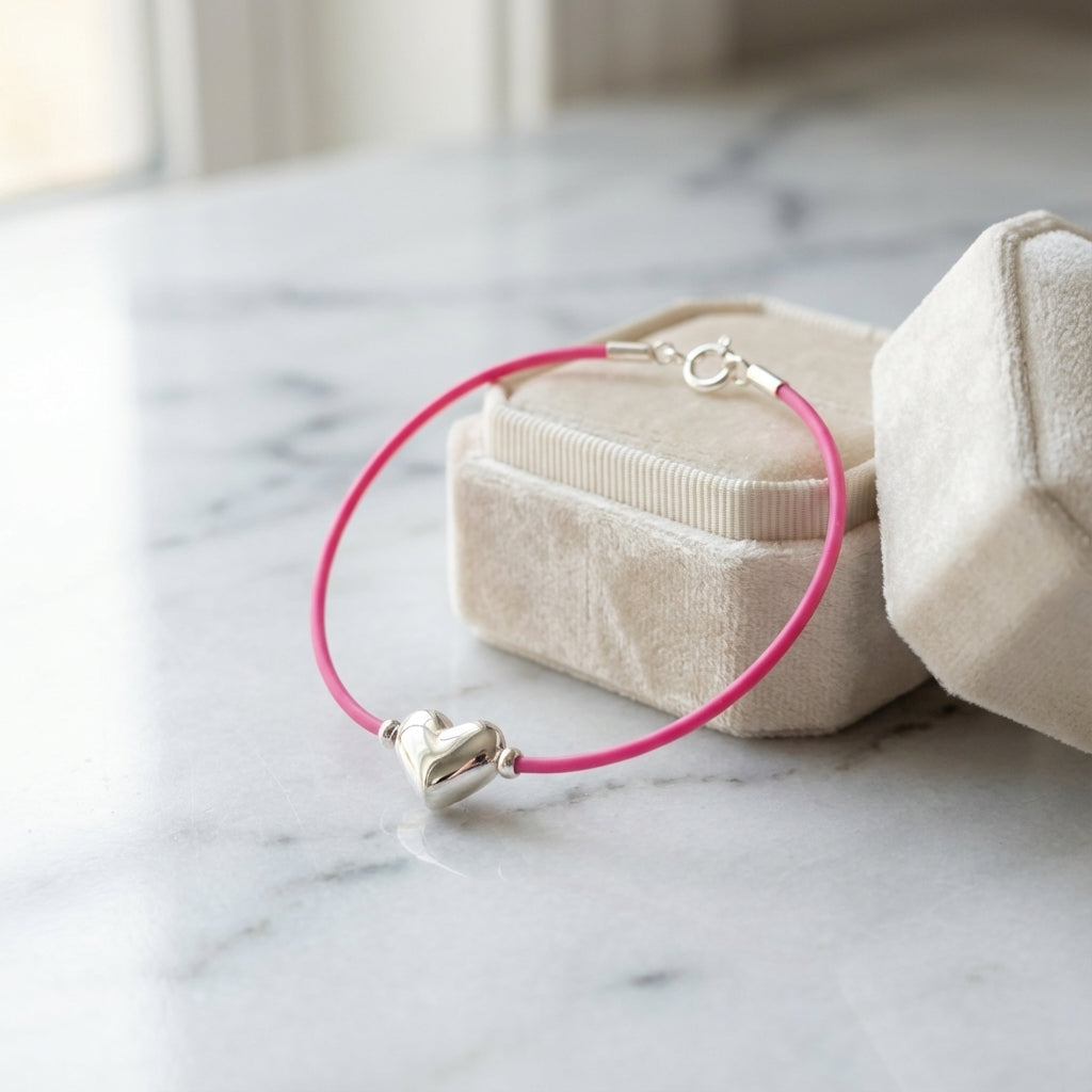Silver Heart Bracelet on Vivid Pink Rubber Cord
