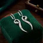 أقراط متدلية على شكل ثعبان من الفضة الإسترلينية المرصعة بالزركون الأبيض والأخضر