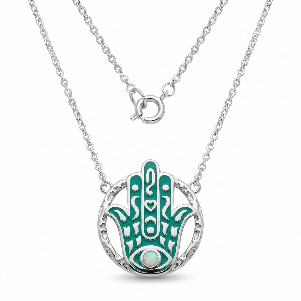 teal enamel hamsa hand pendant in 925 silver with central opal stone and engraved circular frame