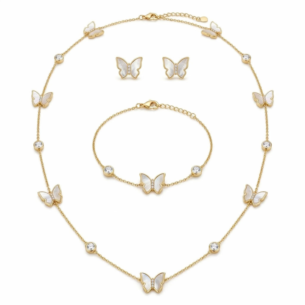 18K gold plated butterfly jewelry set with iridescent mother of pearl motifs and round cubic zirconia bezel accents.