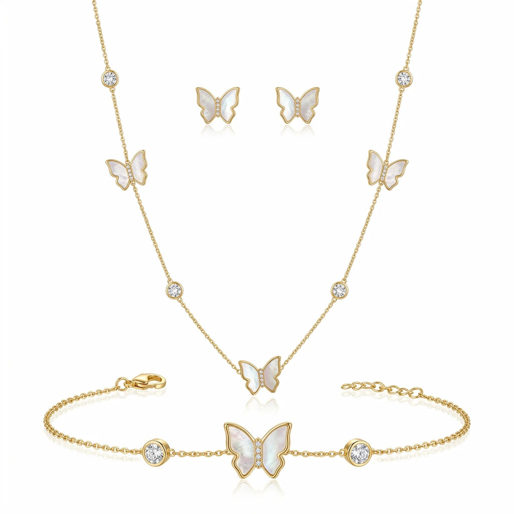Close-up of 18K gold plated mother of pearl butterfly pendant with pave cubic zirconia center and bezel-set crystals.