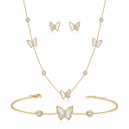 Close-up of 18K gold plated mother of pearl butterfly pendant with pave cubic zirconia center and bezel-set crystals.