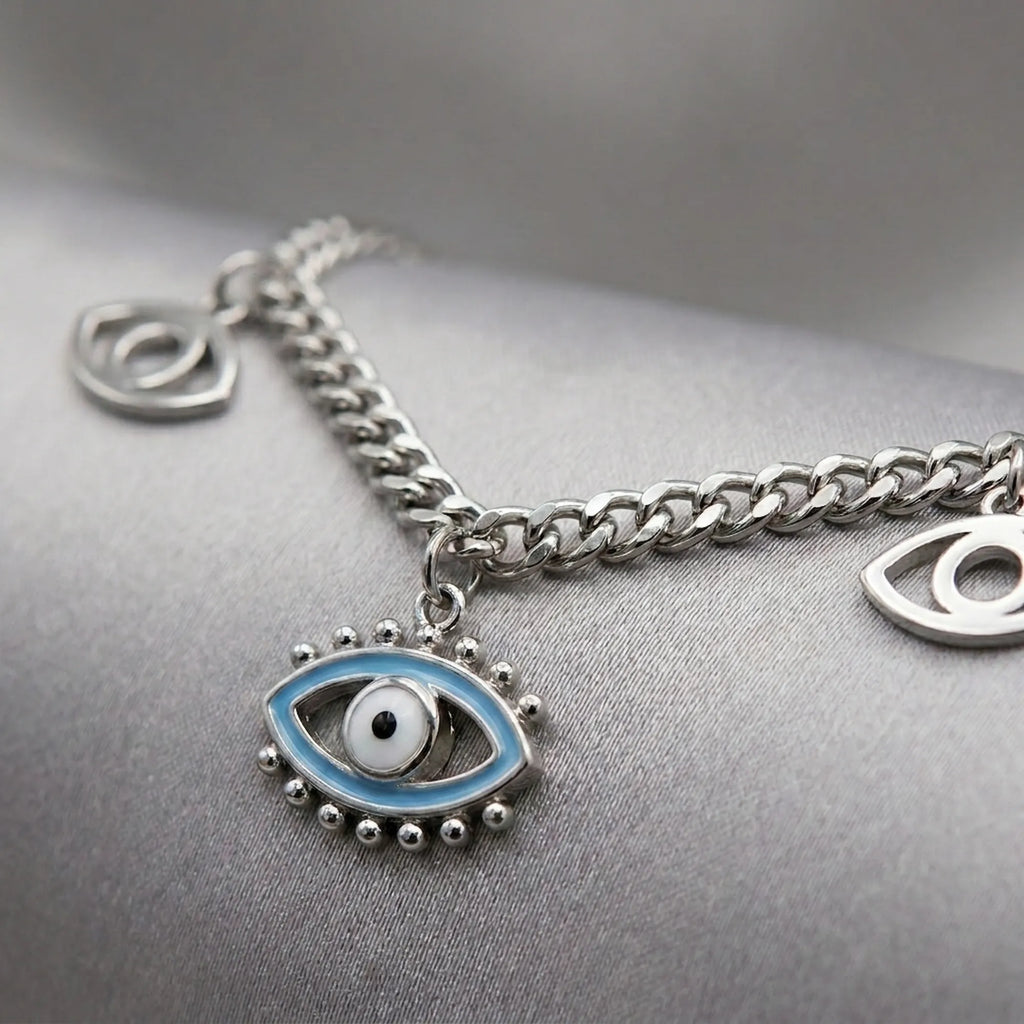 Silver necklace with eye-shaped charm baby blue enameled 