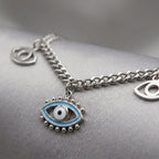Silver necklace with eye-shaped charm baby blue enameled 