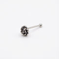 Silver rose-shaped earring in Dubai on a white background