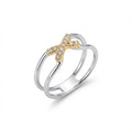 rhodium plated ring with yellow gold cross set in cubic zirconia modern curved double line design