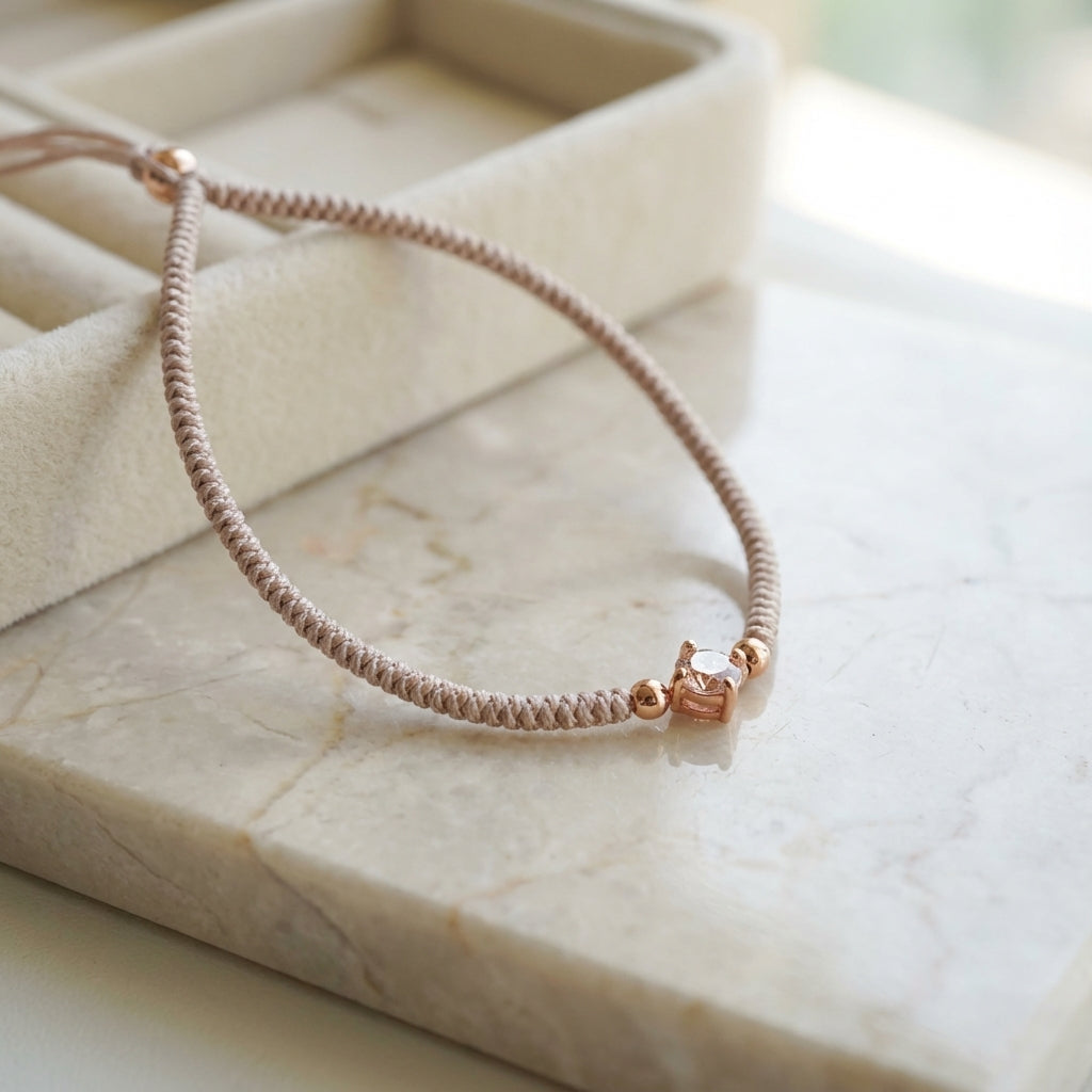 Greige Paracord Bracelet with Rose Gold Crystal Core