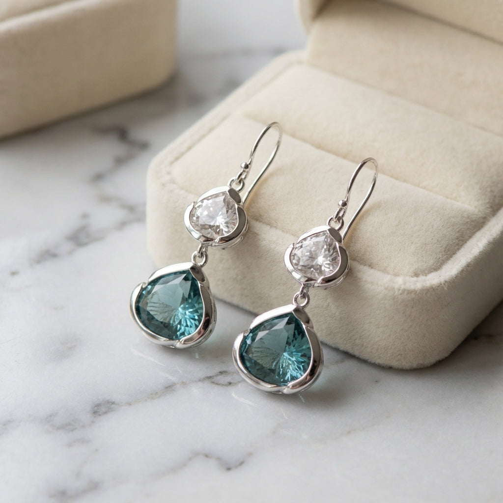 Blue Lotus Dangle Earrings in Sterling Silver with Sky Blue and White Topaz