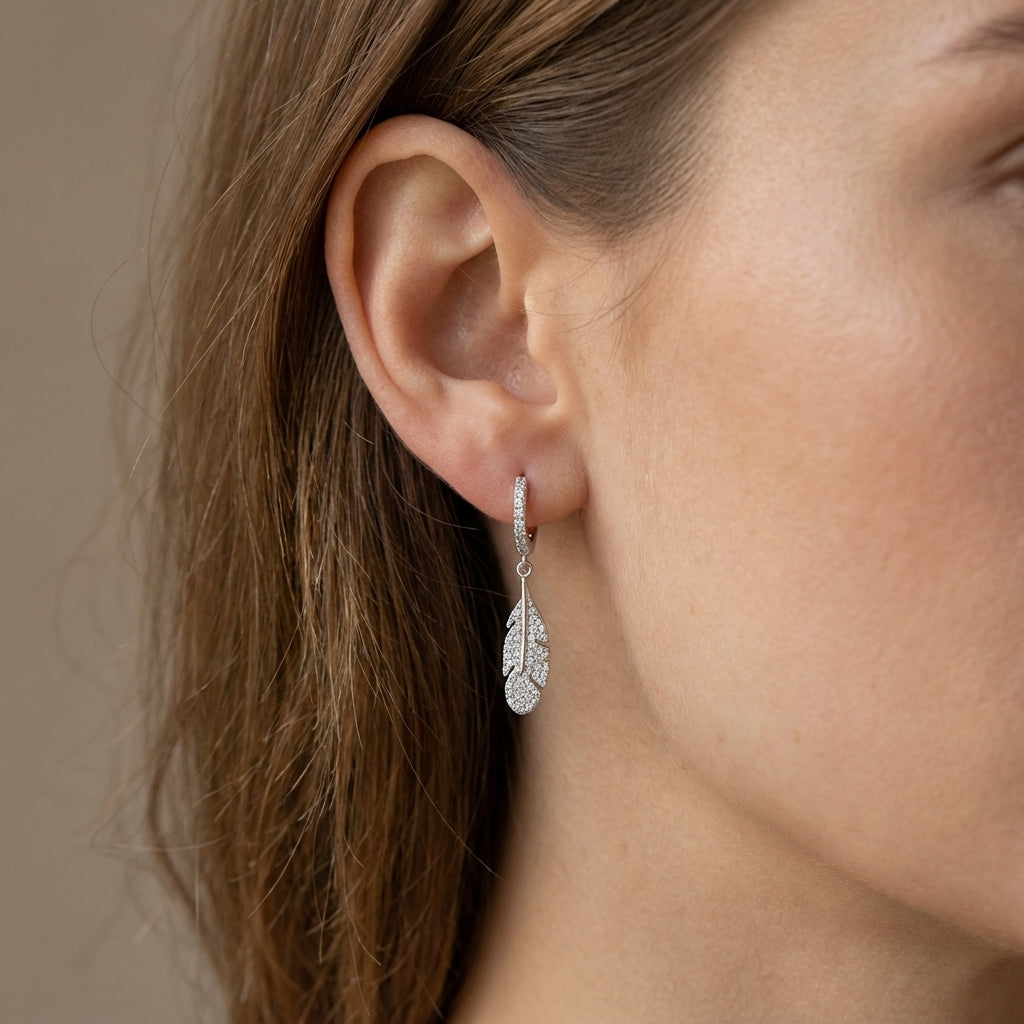 Crystal Feather Huggie Earrings in Sterling Silver