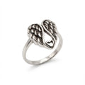 oxidized silver ring with detailed sculpted wings forming a downward heart shape in Dubai.