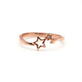 rose gold ring with three mixed stars one hollow one with rhinestone and one solid on silver base