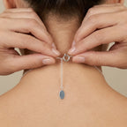 How to wear a silver necklace with a pendant on a neutral background, Sring lock closer