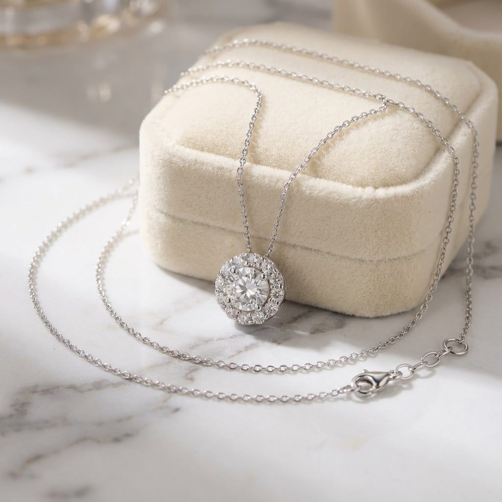 925 Silver necklace with a cubic zircon pendant on a marble surface