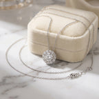 925 Silver necklace with a cubic zircon pendant on a marble surface