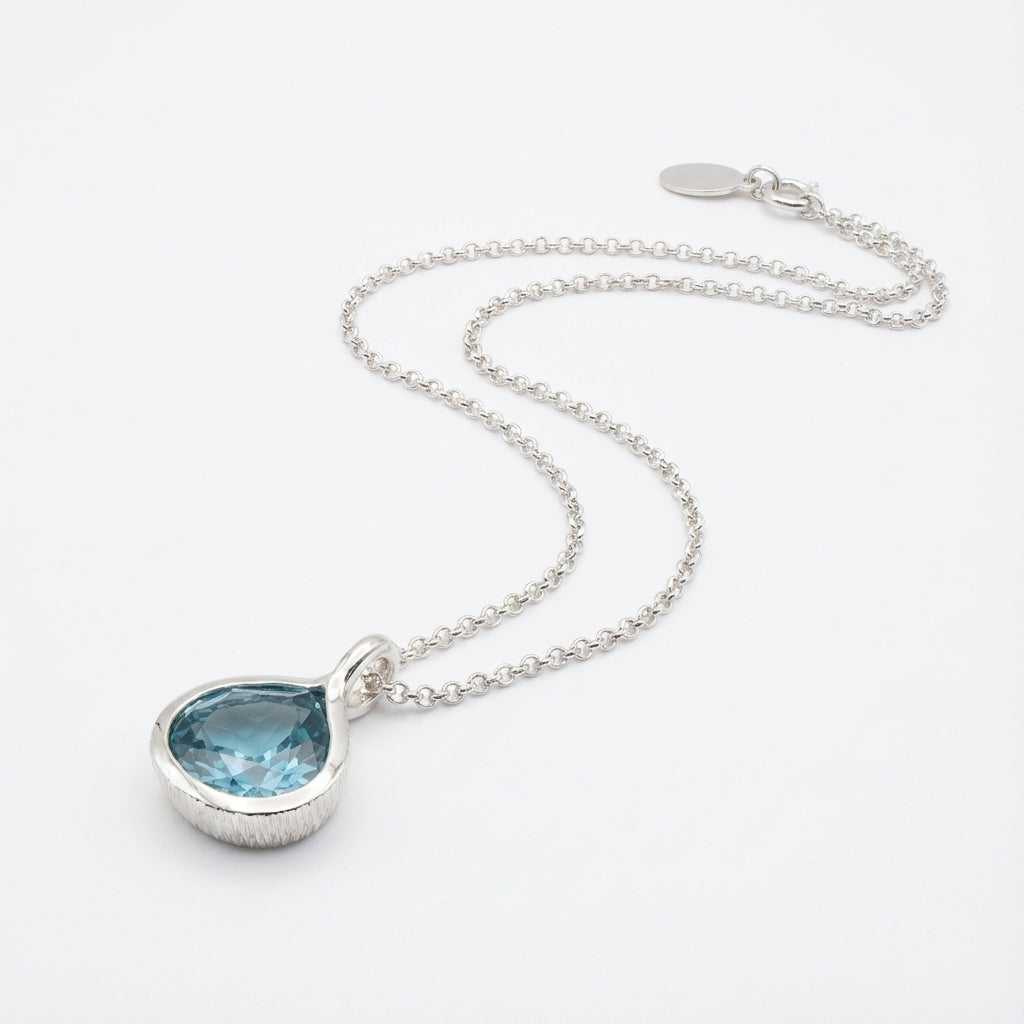 Blue Lotus Silver Pendant Necklace with Sky Blue Topaz