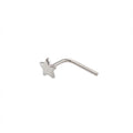 Silver nose ring in Dubai  with star-shaped end on a white background