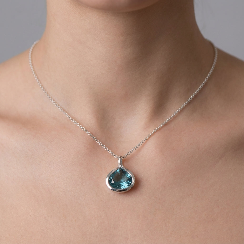 Blue Lotus Silver Pendant Necklace with Sky Blue Topaz