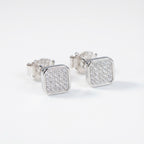 Silver square earrings with a glittery finish on a white background UAE