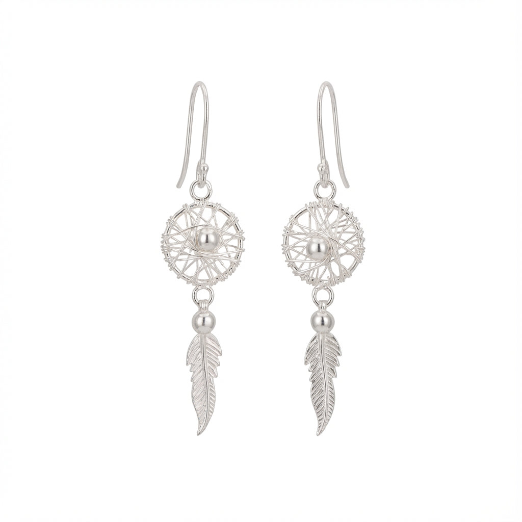 Silver dreamcatcher earrings with feathers on a white background Dubai UAE