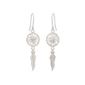 Silver dreamcatcher earrings with feathers on a white background Dubai UAE