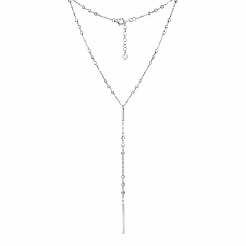 Detail of rhodium-plated 925 silver Y-drop necklace with cube bead stations and geometric bar.