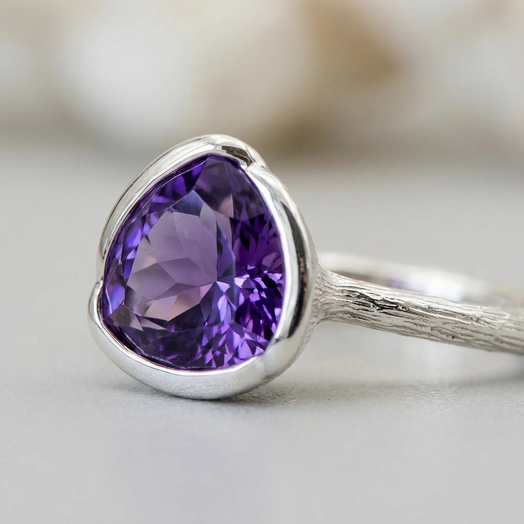 silver amethyst lotus cocktail ring featuring a natural amethyst in a silver semi-bezel, a birthday gift in Dubai.