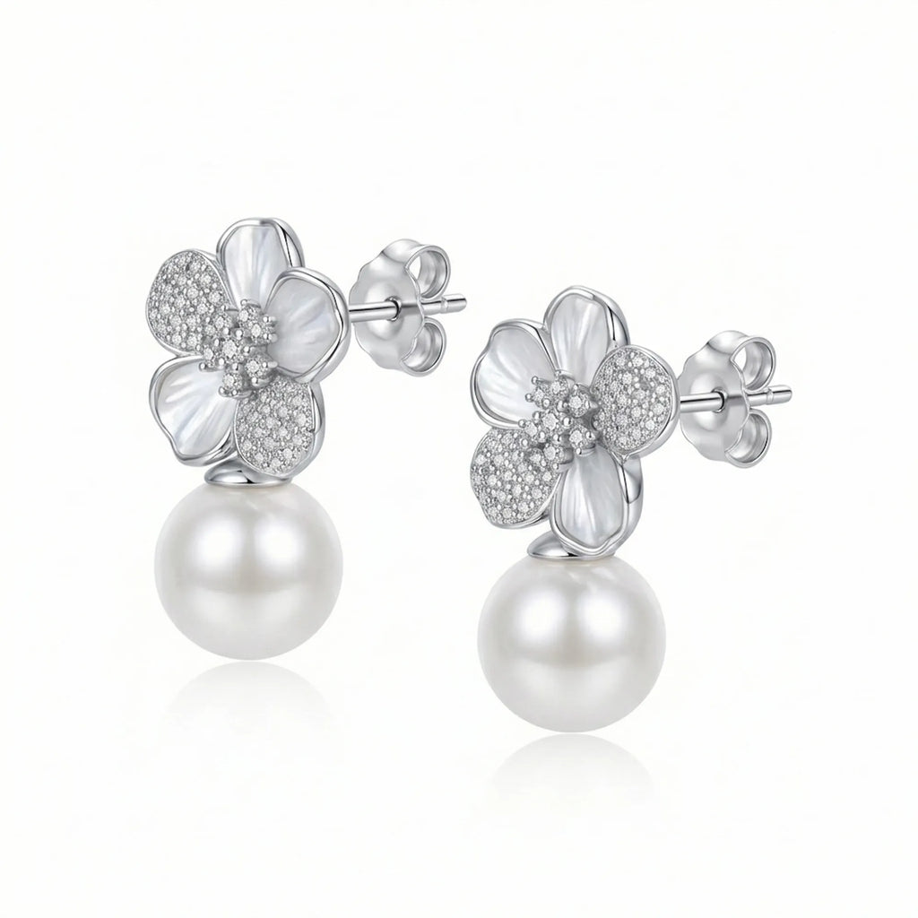 Tilted perspective revealing the depth and curved petals of 925 silver botanical jewelry.