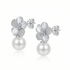 Tilted perspective revealing the depth and curved petals of 925 silver botanical jewelry.