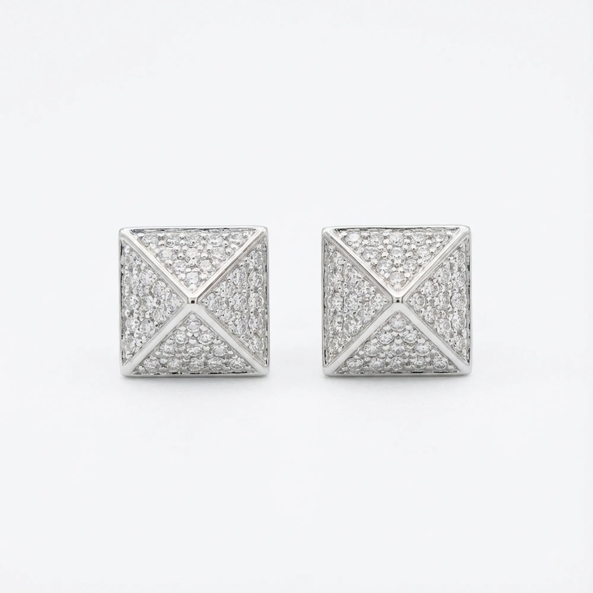 Pyramid CZ stud earrings in rhodium 925 silver — 6mm geometric form, micro-pavé CZ on all four faces, white background