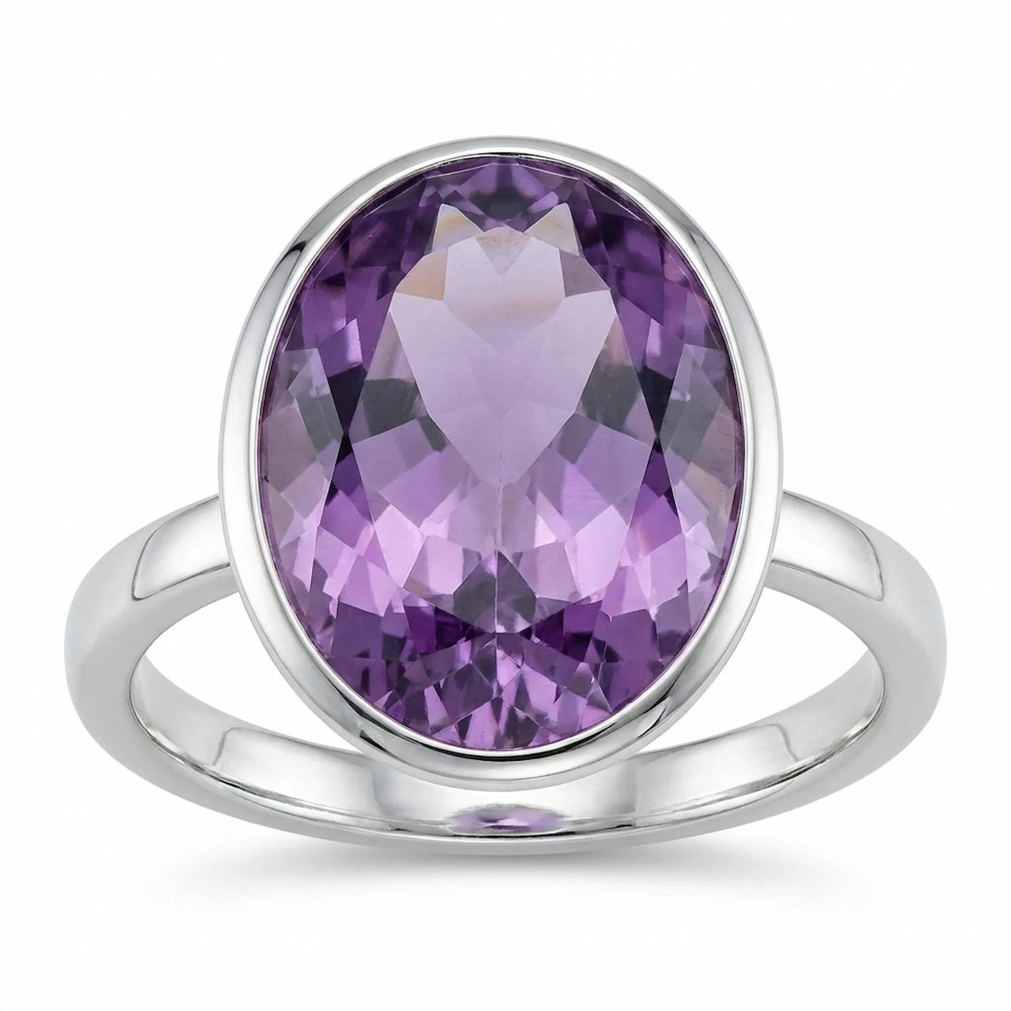 Angled view of a 925 silver oval amethyst ring showing the thick, protective bezel setting and smooth band